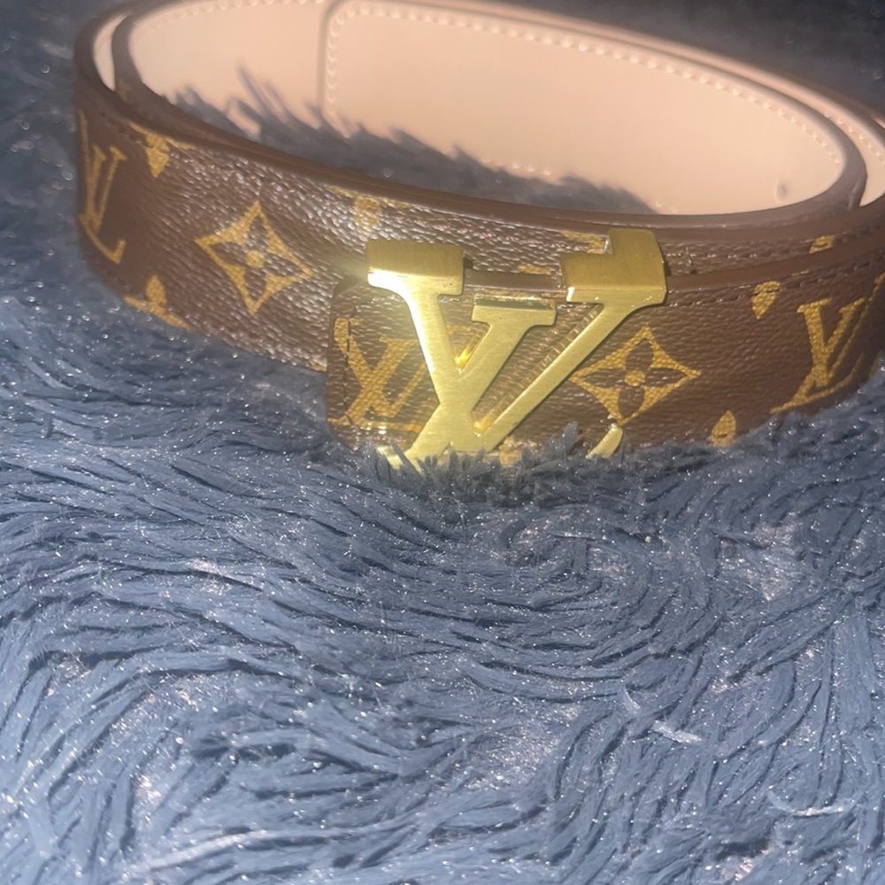 It’s a brown leather Louis Vuitton Belt…Bought for my mans & he didn’t like it. - Picture 3 of 4
